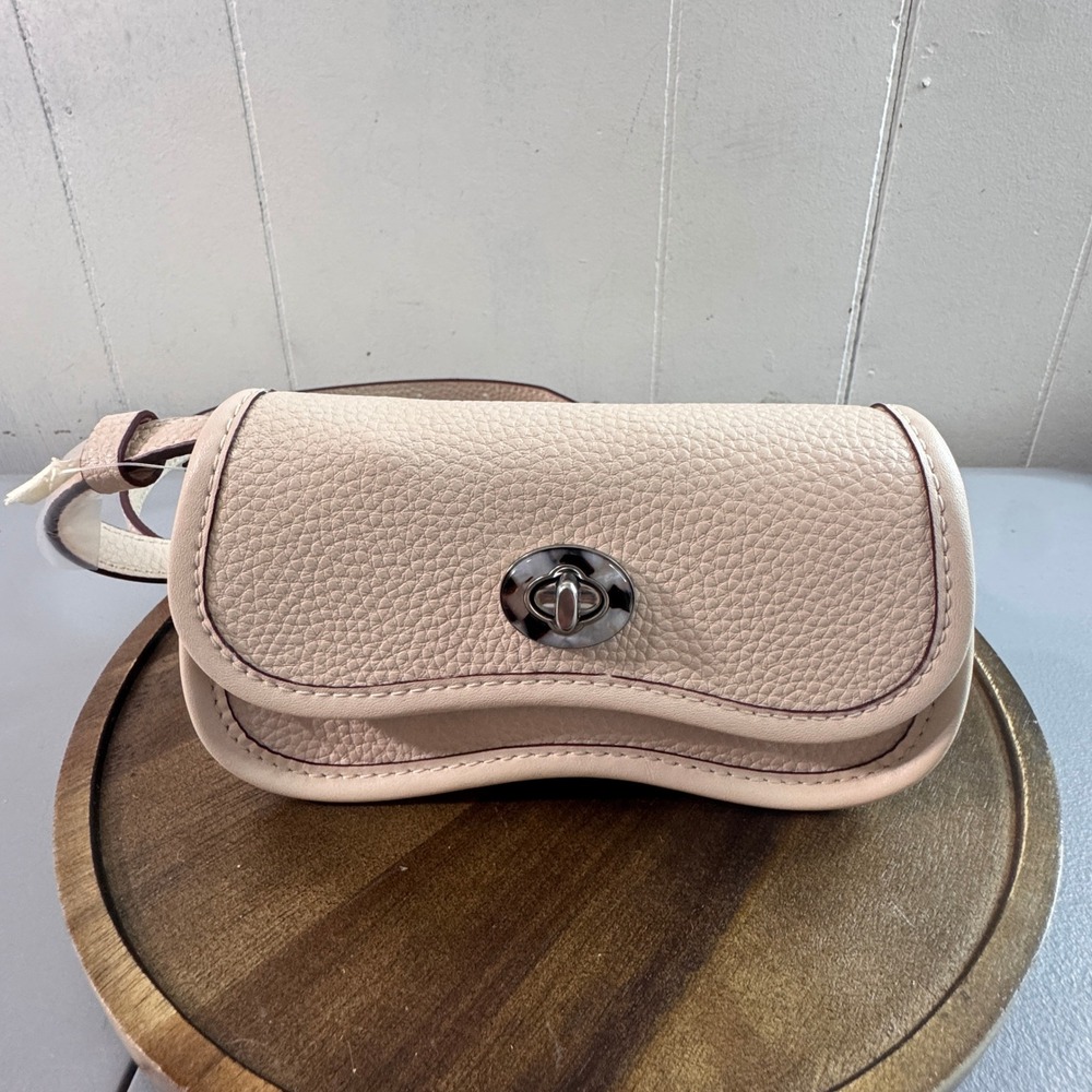 Coach Pale Pink Pebbled Leather Swing Crossbody